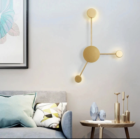 Бра з рухливими плафонами в корпусі золотого кольору 