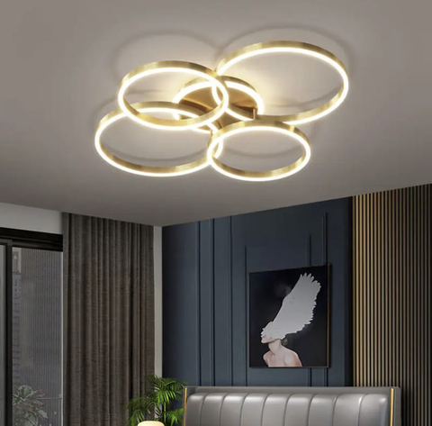 Золота стельова LED люстра Anelli на 4 кільця