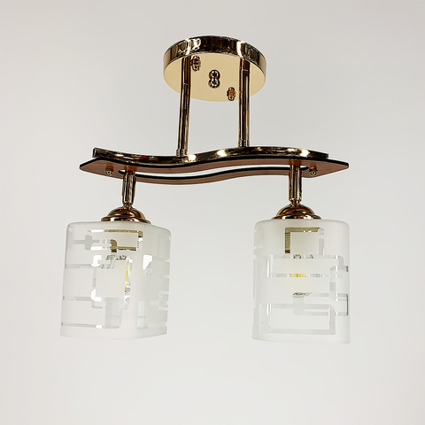 Стельовий світильник в золотому корпусі на 2 плафони