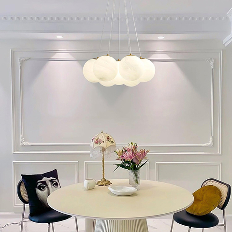 Люстра-пучок на 7 мармурових плафонів у латунному корпусі