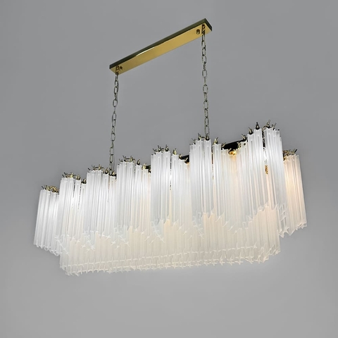 Латунна люстра з матовими скляними підвісками у видовженому корпусі 110х30 см