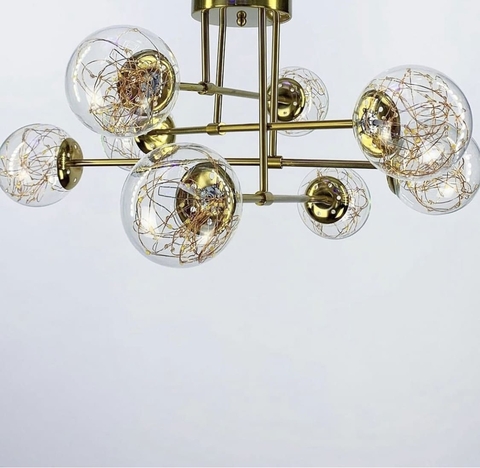 Латунна LED люстра на 8 прозорих плафонів із вбудованими світлодіодами