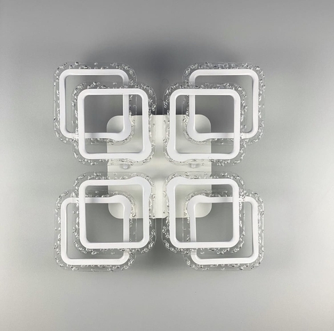 Люстра в матовому білому корпусі з прозорим акрилом